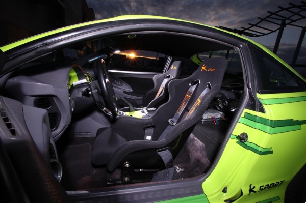 Mitsubishi Eclipse D3 Tuning: Streetracer in schwarz-grüner Mission: Sitze von K-Sport geben den Insassen sicheren Halt. (Bild 26)